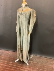 19th Century Victorian Tea Gown: A 19th Century Victorian Tea Gown. Holes and staining present. Embroidery work excellent. Lined garment with pockets. Average Size M. Please see photograph preview. Dimensions: 58"L, 15" armpit to