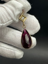 14K Yellow Gold Diamond and Amethyst Drop Pendant: 14K Yellow Gold Diamond and Amethyst Drop Pendant. Dimensions: 2”. Total weight: 4 grams.