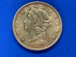 1904 $20 Double Eagle Gold U.S. Coin: .1904 $20 Double Eagle Gold U.S. Coin.90% gold purity. Very good detail,Total weight: 0.9675 troy ounce.