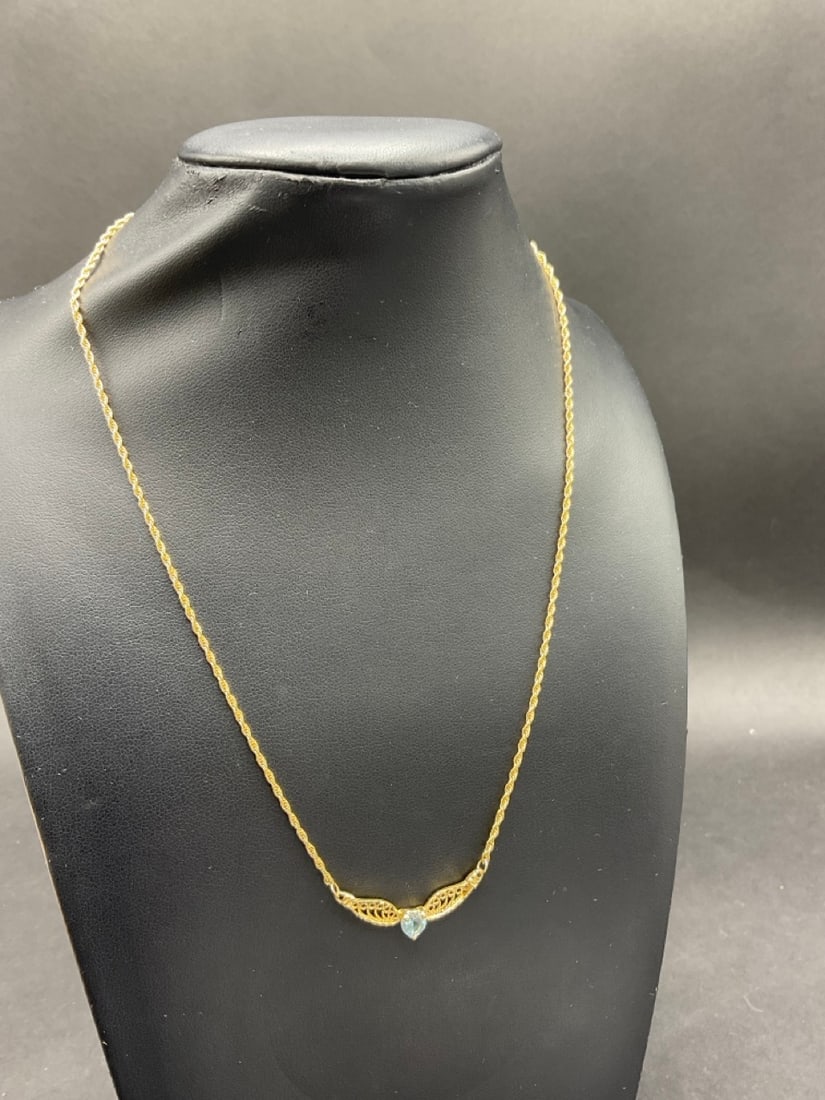 14K Yellow Gold 18 Inch Blue Topaz Rope Chain Necklace: A 14K Yellow Gold 18 Inch Blue Topaz Rope Chain Necklace.Total weight: