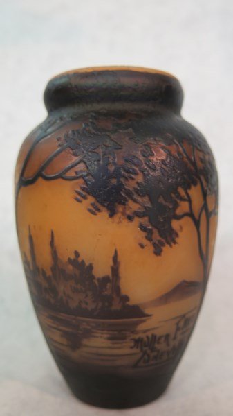 Muller Freres Cameo Glass Landscape Vase: A Muller Freres Luneville Cameo Glass vase depicted a lake side with trees and mountains. Dimensions:4.5" height. Provenance: Estate of Mr. HJ Gerston