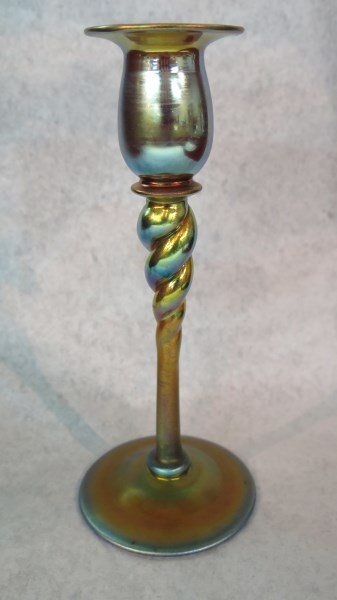 Steuben Aurene Glass Candlestick: Steuben Aurene glass candlestick no.656 at base. Signed Aurene. Dimensions: 8"h Provenance: Estate of Mr. HJ Gerston