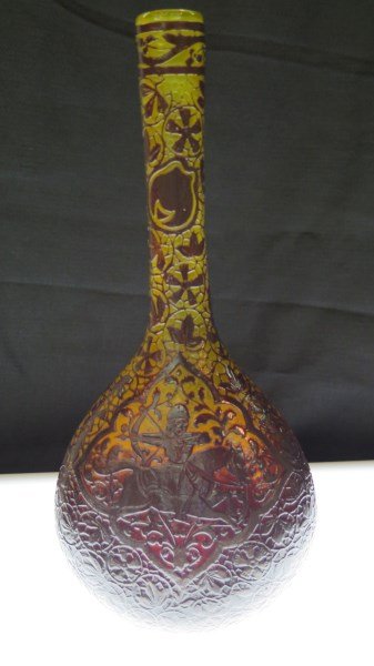 Rare Galle Art Glass Persian Vase: A Rare Galle art glass Persian vase depicting a warrior on horse back. Very finely designed with Lemon yellow ground. Comes with receipt of purchase c.1971. Dimensions: 9 3/4" h X 4.1/2"w Provenance: 