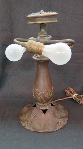 E. Miller & Co. Lamp Base: A E. Miller & co. Lamp Base signed at base EM & co. number 683. Dimensions:15"h X 7.5"diameter.Provenance: Estate of Mr. HJ Gerston.