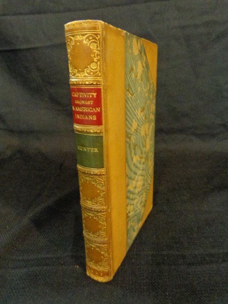 Memoirs of captivity amongst the Indians... by Hunter: Memoirs of captivity amongst the Indians of North America... by John D. Hunter, 1823, new ed. London: Longman, Hurst, Rees, Orme, and Brown. Howes H813 Leatherbound, gold gilt pages Inv. 232