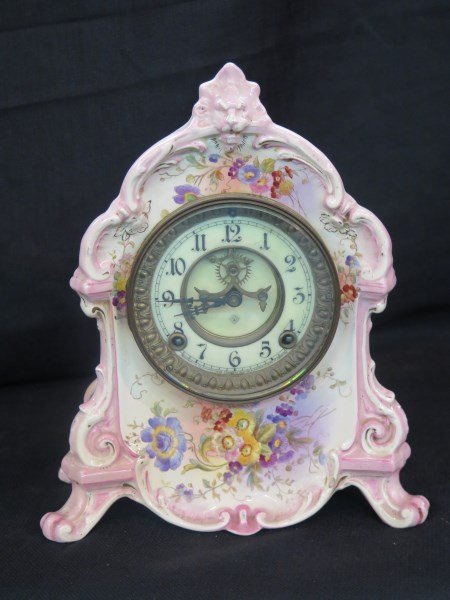 Ansonia Mantel Clock with Royal Bonn Case: A Victorian Mantel clock by Ansonia in a signed Royal Bonn porcelain case. Dimensions: 8" X 12" Inv.177