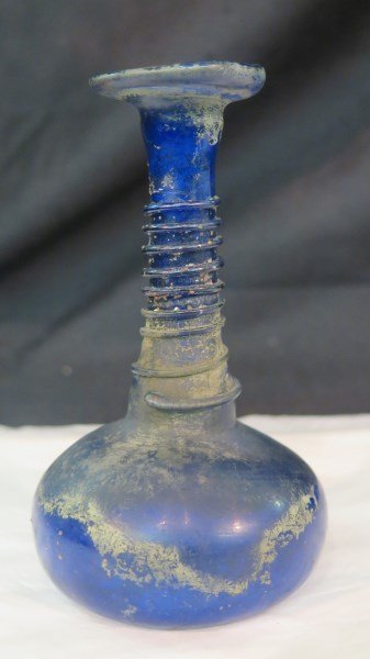 Ancient Style Cobalt Blue Roman Glass bottle: Ancient Style Cobalt Blue Roman Glass bottle, Measures 5" x 3" H, Excellent condition, normal age wear. Unknown age. Please preview or call for details.