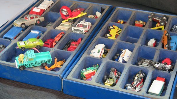 Estate Find Of Corgi, Matchbox & Various Toy Cars: A Grouping consisting of Two cases of toy cars including Corgi, Corgi Junior, Matchbox, Tootsie Toy, Marx, James Bond Aston Martins in Two sizes, Man from Uncle, Landrover Whizzwheels and more!