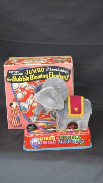 Jumbo.. The Bubble Blowing Elephant Japan Batt. Op. Tin: Vintage Jumbo, The bubble blowing elephant. Made in Japan by E.T. co. Battery operated tin toy. Mint in Box, Never used. Dimensions: 7" X 7"