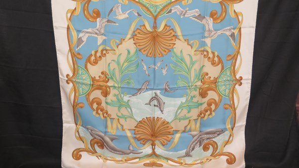 Salvatore Ferragamo Silk Scarf Sea Life Scene Dolphins: A Salvatore Ferragamo silk scarf with sea life Dolphin scene. Dimensions: 33" X 33" Inv.364