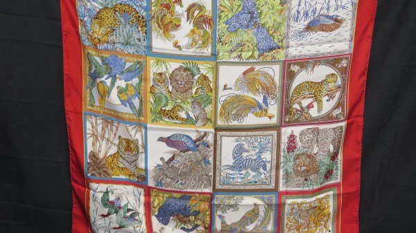 Salvatore Ferragamo Silk Scarf Paneled Jungle Animals: A Salvatore Ferragamo silk scarf with paneled Jungle and wildlife animals. Dimensions: 34" X 34" Inv.365