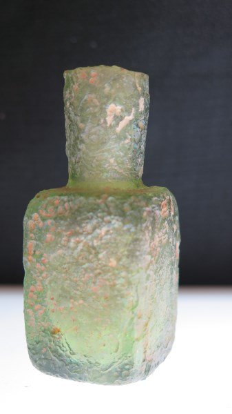 Ancient Roman Glass Scent Bottle, Green: An Ancient Roman glass scent bottle. Green color. Dimensions: 2.5" Height X 1" Width.