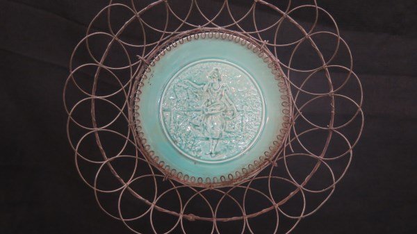 Antique Wire Egg Basket with Porcelain Insert: An Antique wire egg basket with blue porcelain insert. Possibly German. Marked on reverse 203 and letter X or Cross Marks. Fine condition. Dimensions:8" diameter X 3" height. Inv. 26