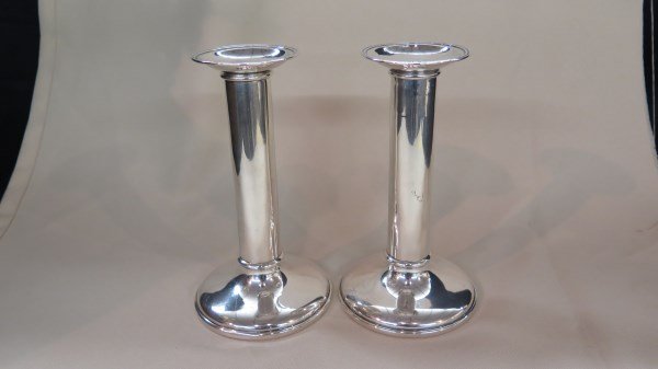 William Nost . Bronx N.Y. Sterling Silver Candlesticks: A Pair of William Nost c. 1913-1925 Bronx NY, Sterling silver candlesticks. Weighted. Dimensions: 6 1/4" Height. T.W. 20.3 avg. oz. Inv. 448