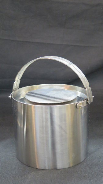Stelton Danish Modern Ice Bucket Arne Jacobsen Design: A Stelton stainless steel ice bucket. Made in Denmark c. 1960's designed by Arne Jacobsen. Dimensions: 6" X 7" diameter. Inv. 33