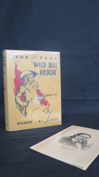 1st Edition with Rare Brochure. Real Wild Bill Hickok: Eisele, Wilbert Edwin. Real Wild Bill Hickok. 1st Edition. Denver: William H. Andre, 1931. Original Cloth with dust jacket and rare brochure pamphlet. Inv. A440
