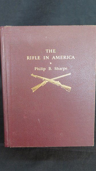 Rifle in America by Philip B. Sharpe, 1938: Sharpe, Philip B. Rifle in America. NY: William Morrow, 1938. 4to. Note: Inscribed. 1st Edition, Author signed presentation copy to Major Thomas A. Harkies. Inv.127