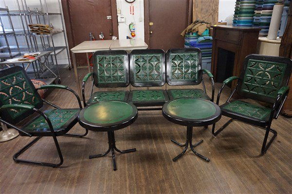 Art Deco Outdoor Garden Furniture: Art Deco Outdoor Garden Furniture. Stencilled Metal painted in black with green. Including Glider Couch, Two (2) Chairs and Two (2) Tables.