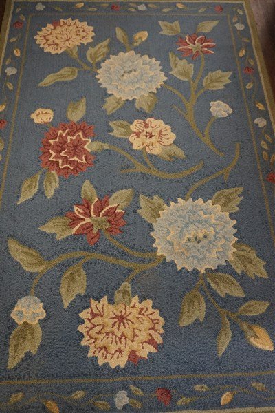 Edward Fields Floral Virgin Wool Area Rug: A floral 100% Virgin wool floral rug.Maker: Edward FieldsSigned.Dimensions: 4' X 6'