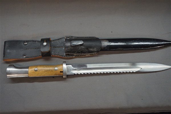 German Mauser Saw Back Bayonet: German Mauser saw back bayonet. Marked Gebr Heller Marienthal Dimensions: 15"