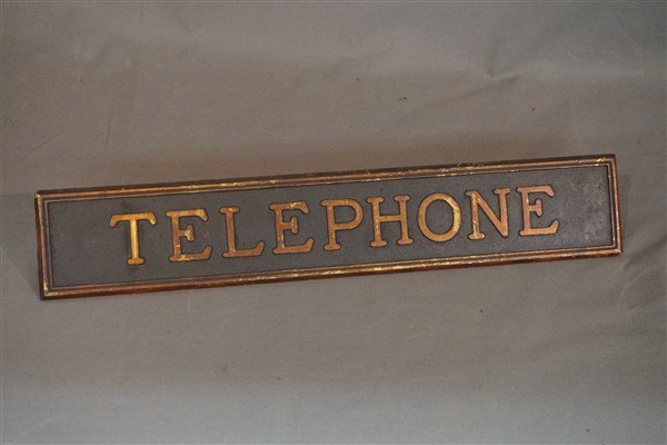 Vintage Telephone Booth Sign: A metal telephone booth sign. c.1940's with gold gilt lettering. Dimensions: 13 1/2" X 2 1/2"