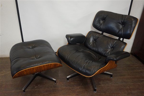 Herman Miller Lounge Chair with Ottoman: Herman Miller Lounge chair by Charles & Ray Eames. Molded Rosewood and black leather. Purchased c.1989Near mint condition showing no damage. Dimensions: 31" X 32" X 32"Ottoman : 26" X 22" X 16"