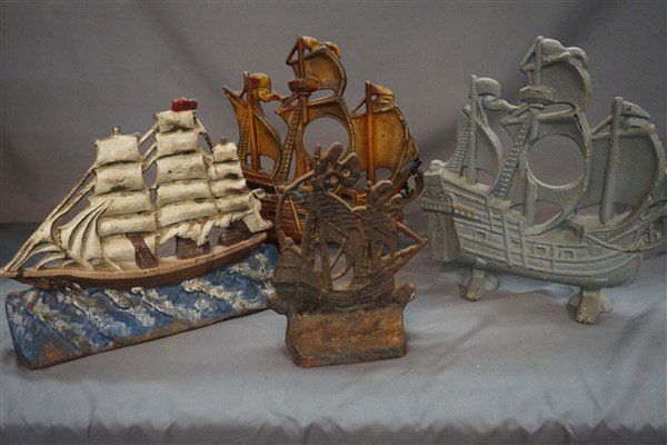 Four (4) Antique Cast Iron Ship Doorstops: Four (4) Antique Cast Iron Ship Doorstops. All original. Dimensions: 9" - 11"