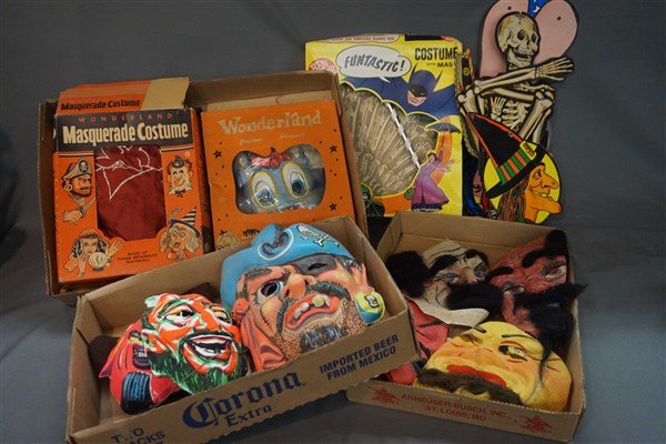 Vintage Halloween Costumes: A grouping of vintage Halloween costumes and decorations. As seen in photograph preview.