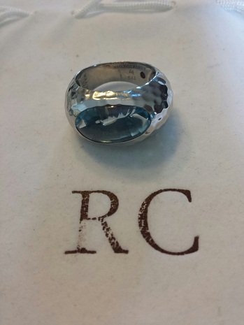 Roberto Coin Blue Topaz Hammered Ring Sz 7: Roberto Coin Fifth Season Blue Topaz Hammered Silver Ring Sz 7 new without tags. Comes with Roberto Coin pouch.