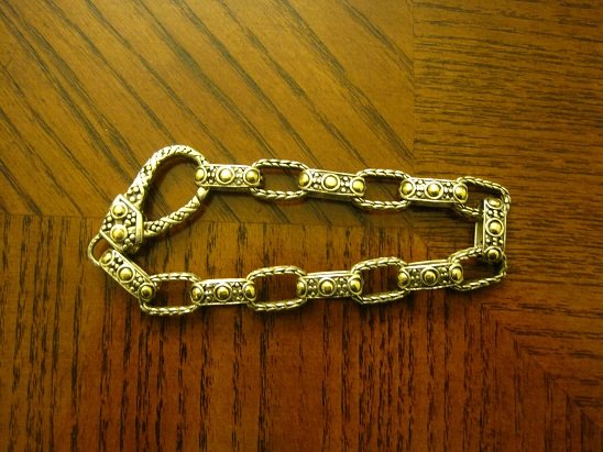 John Hardy 925/18K Gold Dot Bracelet Lobster Clasp: John Hardy Sterling Silver 18K Dot Bracelet Lobster Clasp. Bracelet weighs 28 grams.