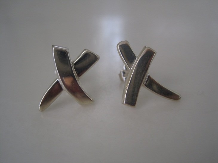 Tiffany & Co Paloma Picasso X Earrings: Pre-Owned Tiffany & Co Sterling Silver Paloma Picasso X Earrings, Retired. Earrings are approximately 1/2" by 1/2". Earrings do not come with pouch or box.