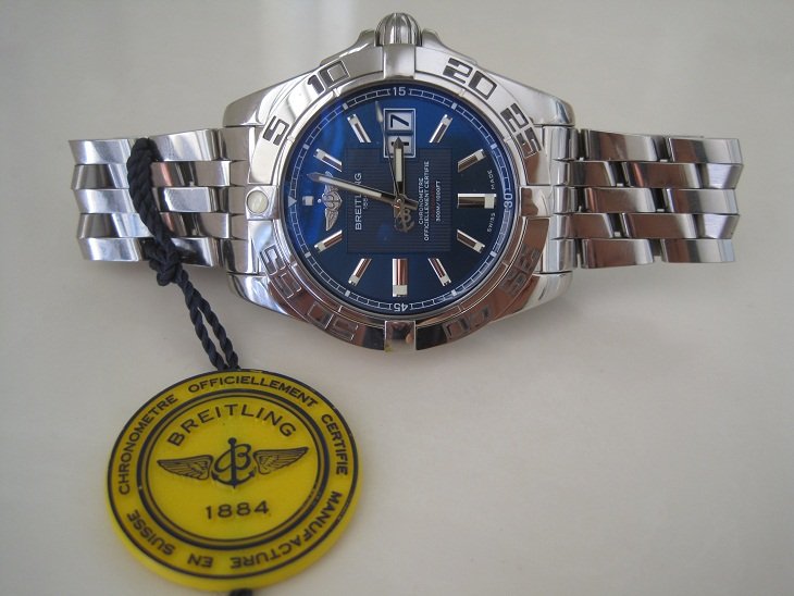 BREITLING WINDRIDER GALACTIC 41 AUTOMATIC WATCH: Breitling A49350 GALACTIC 41MM Case, CHRONOMETER, AUTOMATIC watch with an elegant Blue DIAL and DATE. The elegant blue dial has Silver hands with Lumis, Stick lumi hour markers, and a white date windo