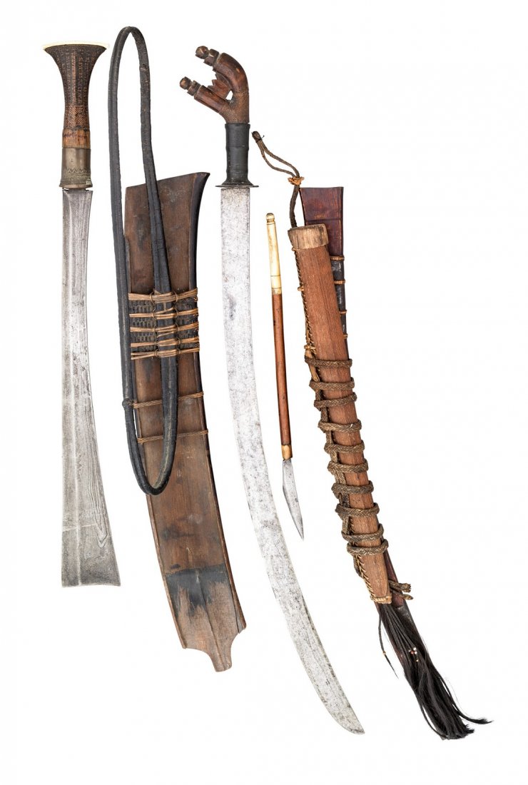 TWO NORTH EAST INDIAN SWORDS (DAO), 19TH CENTURY the: TWO NORTH EAST INDIAN SWORDS (DAO), 19TH CENTURY the first probably Kamti Shan, with broad cleaver-like blade widening towards the tip, the hilt with copper ferrule, wooden grip bound with rattan over