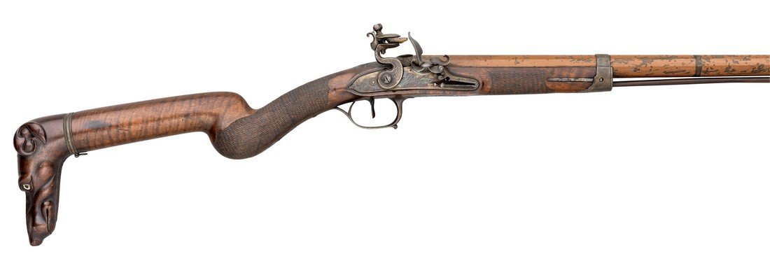A RARE 22 BORE FRENCH FLINTLOCK SPORTING GUN BY BERTHON: A RARE 22 BORE FRENCH FLINTLOCK SPORTING GUN BY BERTHON À AIX, CIRCA 1810 with tapering barrel of 'hog's back' form, retaining much early Japanned camouflage paint (small chips) and retained by a sin