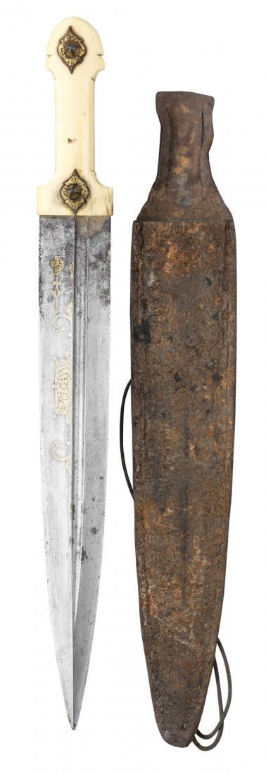##A CAUCASIAN SHORTSWORD (KINDJAL), LATE 19TH CENTURY: ##A CAUCASIAN SHORTSWORD (KINDJAL), LATE 19TH CENTURY with broad double-edged blade formed with an off-set fuller on each face, decorated with gilt scrollwork (rubbed) on one face, characteristic ivor