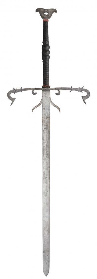 **A BRUNSWICK STATE TWO-HAND PROCESSIONAL SWORD OF THE: **A BRUNSWICK STATE TWO-HAND PROCESSIONAL SWORD OF THE GUARD OF JULIUS, DUKE OF BRUNSWICK AND LÜNEBURG IN WOLFENBÜTTEL (1528-89), NO. 21, DATED 1573 with straight double-edged blade of flattened-dia