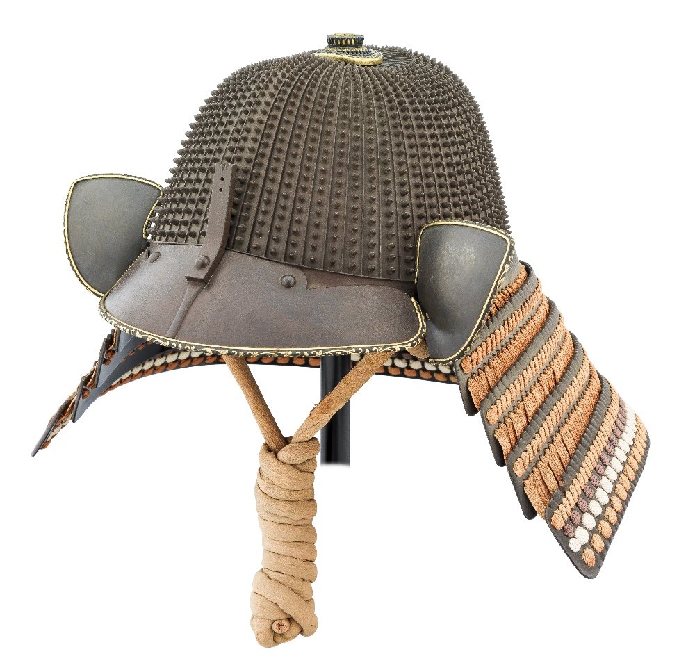 THE PROPERTY OF A COLLECTOR A FINE JAPANESE HELMET: THE PROPERTY OF A COLLECTOR A FINE JAPANESE HELMET (HOSHI SUJIBACHI KABUTO) BY SAOTOME IYECHIKA, EDO PERIOD, MID-17TH CENTURY with very well formed iron skull of sixty-two plates profusely studded ove