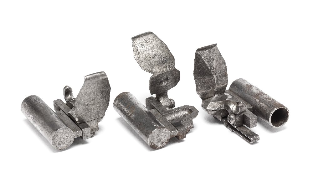 THREE RARE FLINTLOCK CARTRIDGES, FIRST QUARTER OF THE: THREE RARE FLINTLOCK CARTRIDGES, FIRST QUARTER OF THE 18TH CENTURY, GERMAN OR DUTCH each formed of a cylindrical cartridge, fitted on the right with a screw-in pan and sprung steel (light rust) 6.0 cm