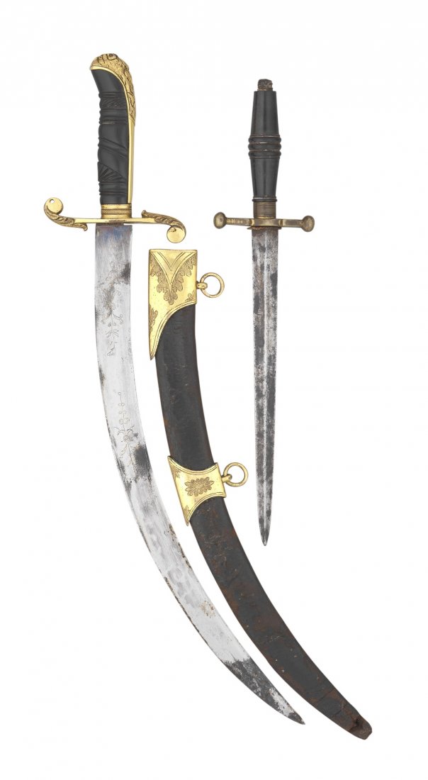 A NAVAL OFFICER'S DIRK, CIRCA 1810 AND A DAGGER, 19TH: A NAVAL OFFICER'S DIRK, CIRCA 1810 AND A DAGGER, 19TH CENTURY with curved single-edged blade double-edged towards the point, etched with foliage and with traces of blued and gilt finish, gilt brass hi