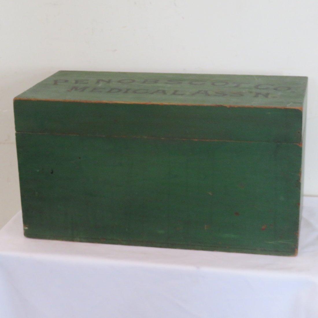 Penobscot Co. Medical Assn. painted pine box: Pine box in old green paint with Penobscot Co. Medical Assn. painted on top, nailed construction, 13" x 24" x 12"
