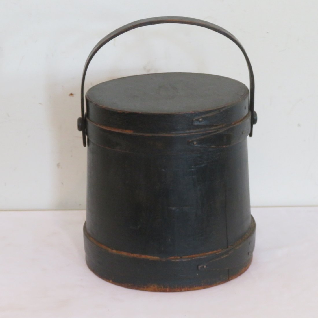 Early wood painted green firkin: Early wood firkin in old green paint, wood staves with copper tacks, lid signed Wilder & Son, South Hingham, Mass., 9' dia. at top, 10" dia. at bottom, 10" height