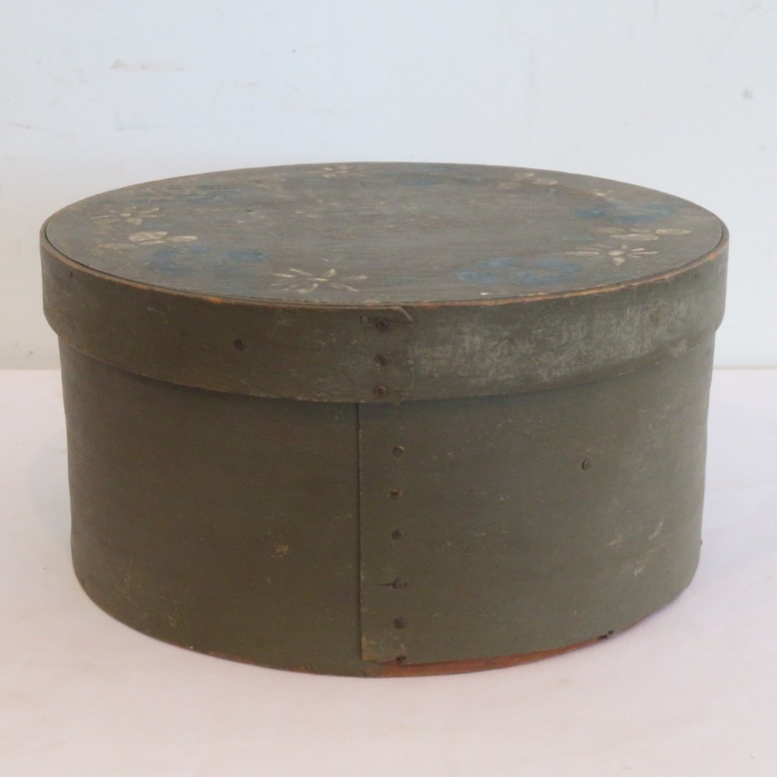 Green painted pantry box with stenciled decorated lid: Olive green painted pantry box with stenciled decorated lid, 5" x 9.75"