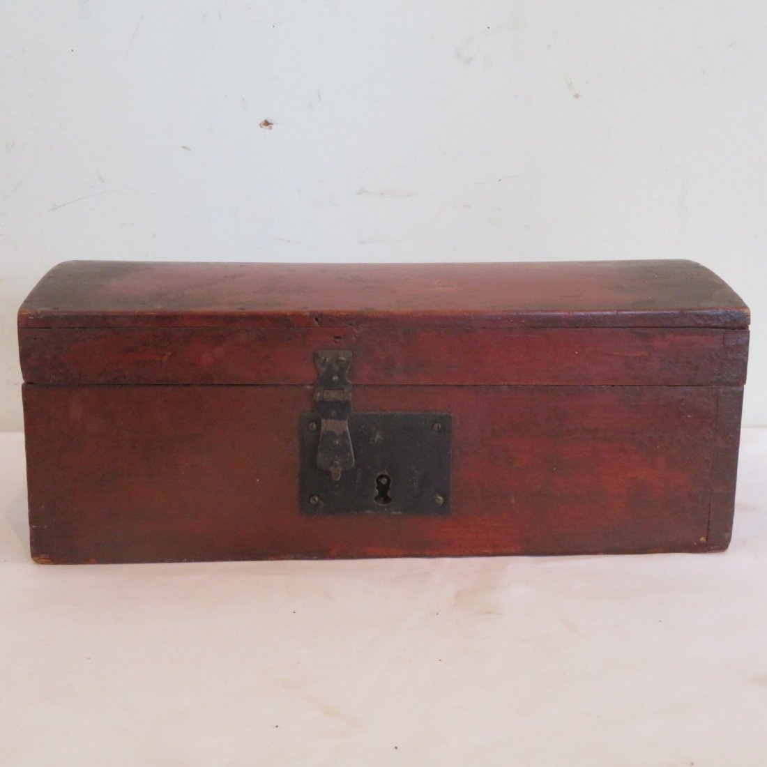 Red painted dovetailed dome top box: Red painted dovetailed dome top box with wallpaper lined interior, 5" x 11.5" x 6.5"