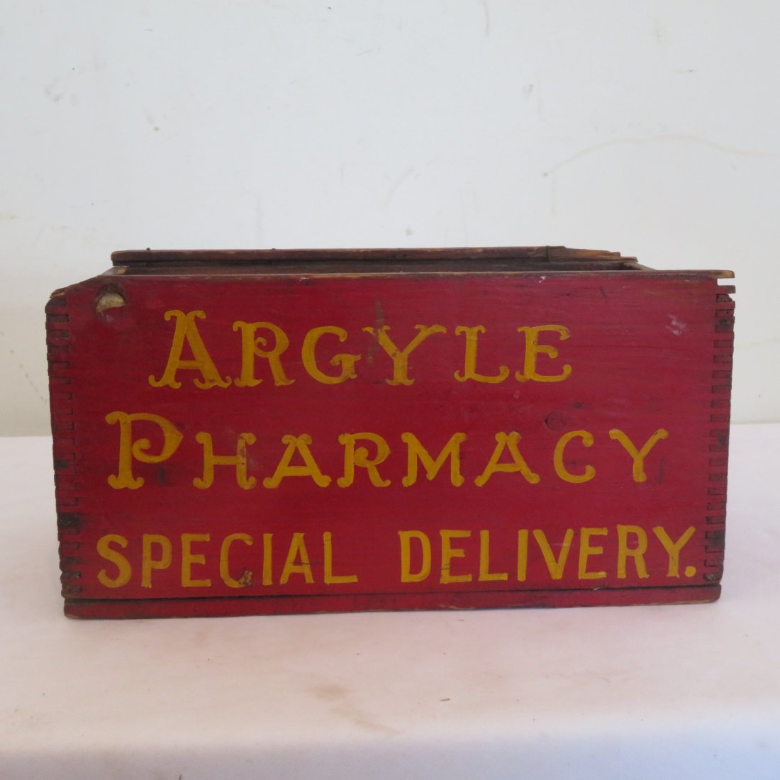 Machine dovetailed red Argyle Pharmacy box: Machine dovetailed red Argyle Pharmacy Special Delivery on 2 sides, A&P logo on 1 end, red paint with mustard letters, 5.5" x 11.5" x 7"