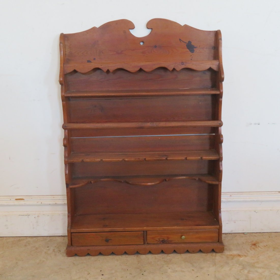 Mid-20th century pine hanging shelf: Mid-20th century pine hanging shelf, spoon notches and 2 drawers, nicely cut-out ends, natural wood patina, 35" x 23.5" x 5.5"