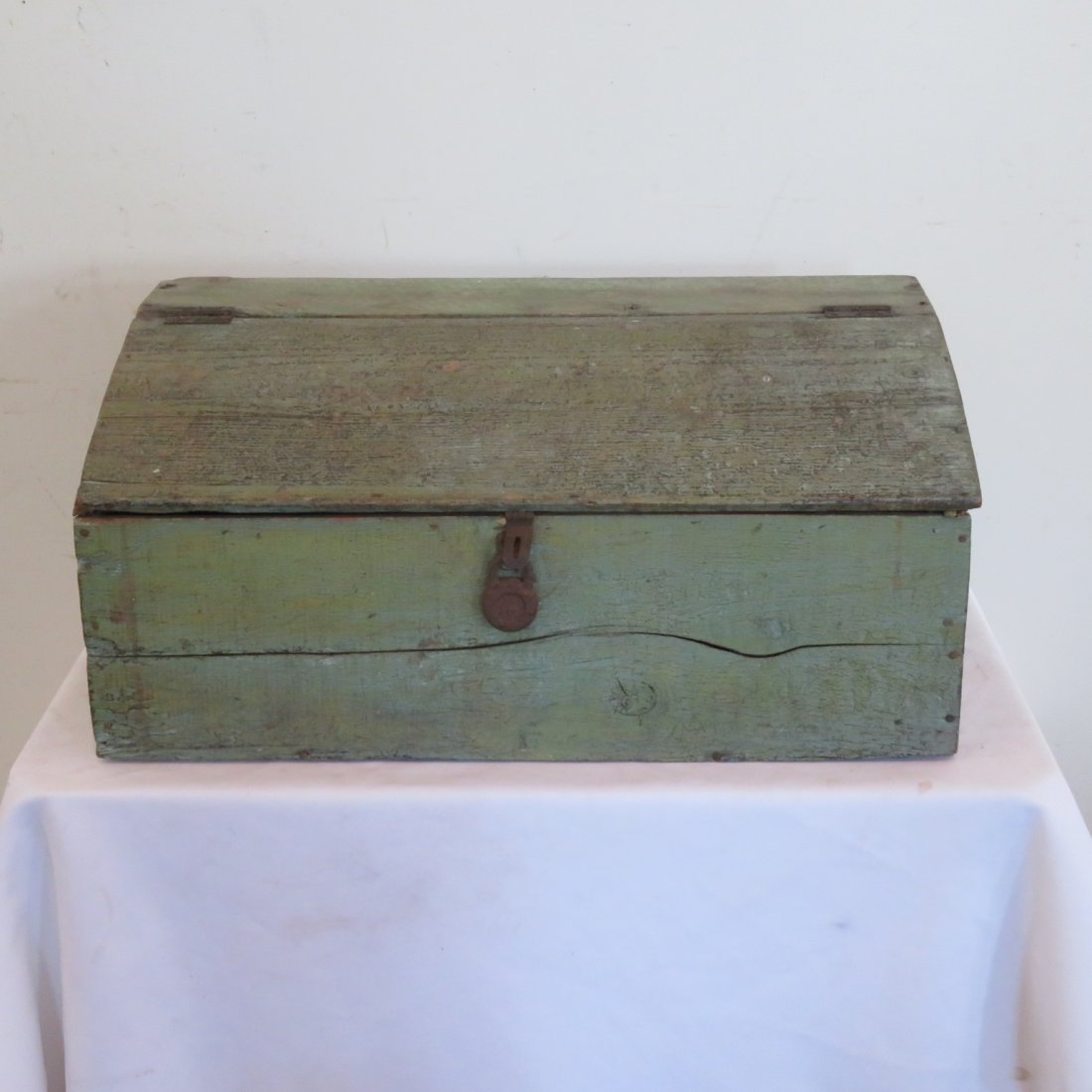 Pine slant lid box in old green paint: Pine slant lid box in old green paint, early 20th century, 11" x 24" x 12"