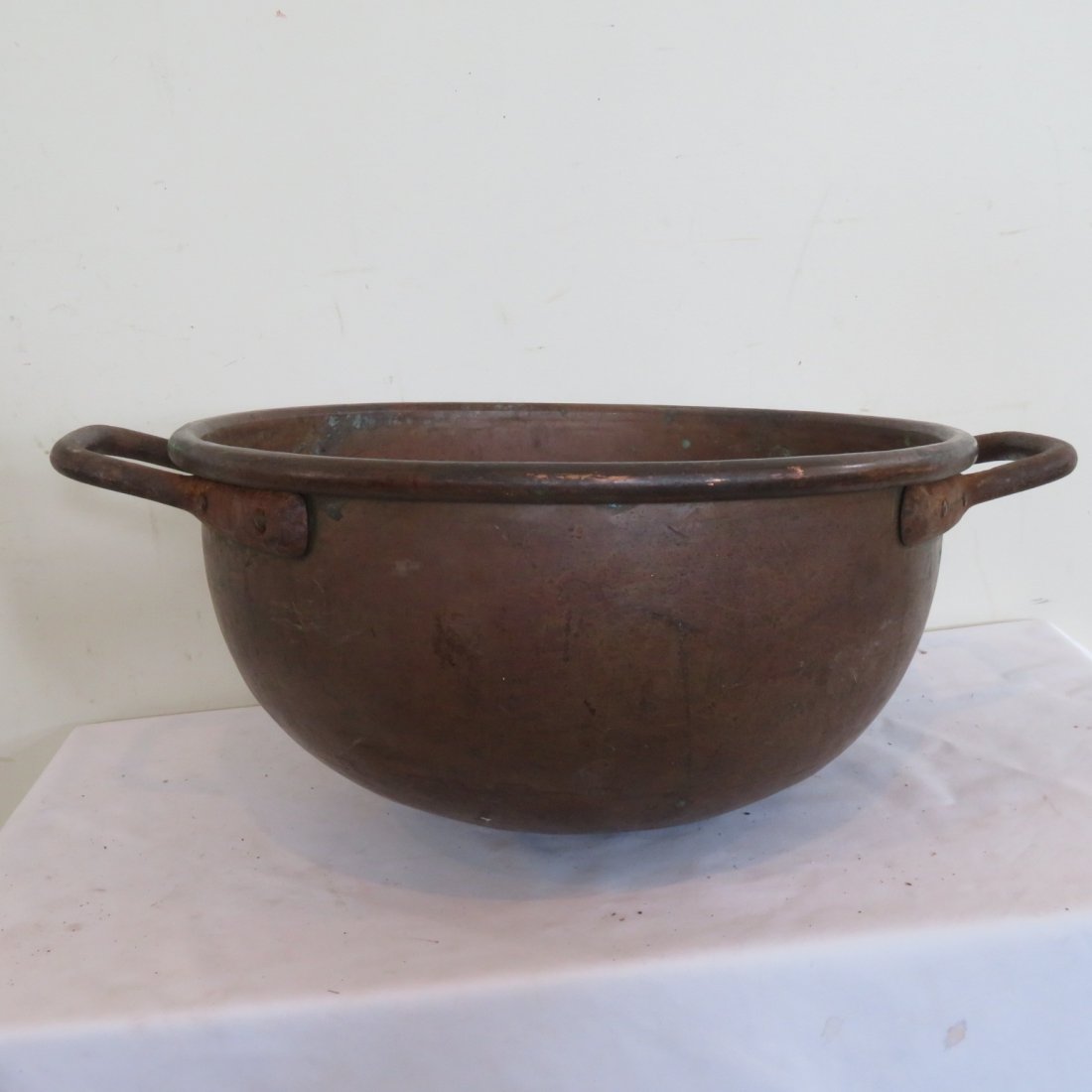 Copper candy making kettle with handles: Copper candy making round kettle with handles, old surface, dovetailed construction, iron handles, 9.5" x 18.5"