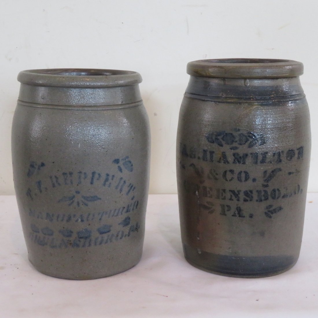 2 Western Pa. stenciled stoneware jars: 2 Western Pa. stenciled stoneware jars including T.F. Reppert, Greensboro, Pa 9.5" x 5.75" and a Jas. Hamilton & Co., Greensboro, Pa 10" x 5.75"