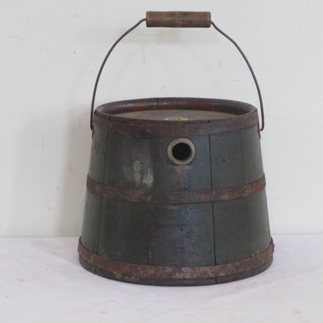 Wood kerosene keg in old green paint: Wood kerosene keg in old green paint, wire bale, wood handle, 9" x 11"