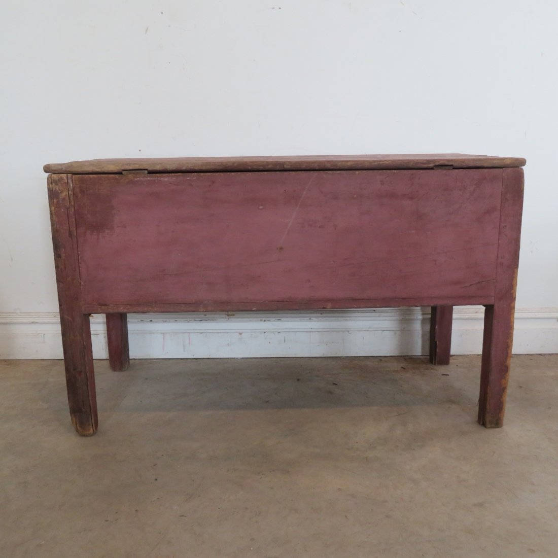 Early pine meal bin in old red paint: Early pine meal bin in old red paint, wood pinned, cleats on lid are dovetailed into the lid, replaced iron butt hinges but don't think it originally had hinges, 30" x 50" x 23"